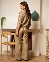 PANTALÓN FLORES MONA TAUPE - Monica Ecco