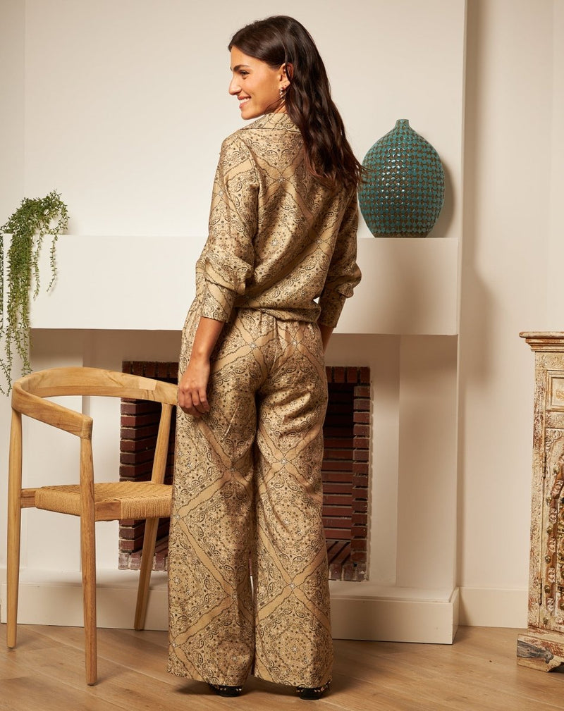 PANTALÓN FLORES MONA TAUPE - Monica Ecco