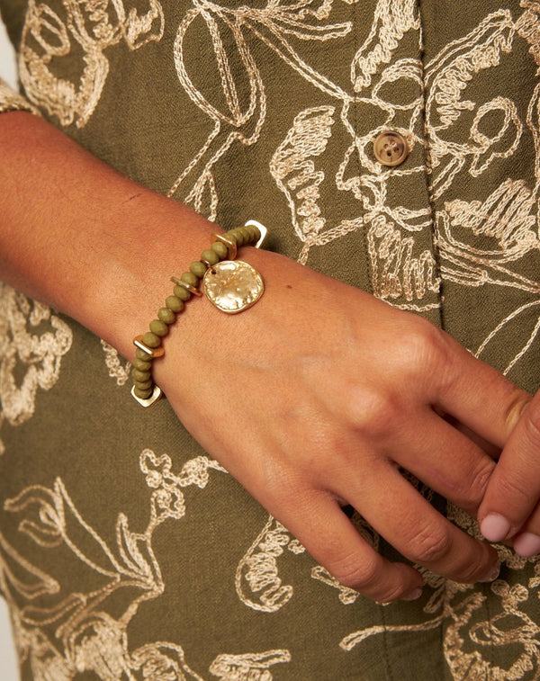 PULSERA CRISTAL ELÁSTICA CHAPA VERDE - Monica Ecco