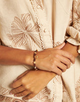 PULSERA CRISTAL MARRÓN FLOR - Monica Ecco